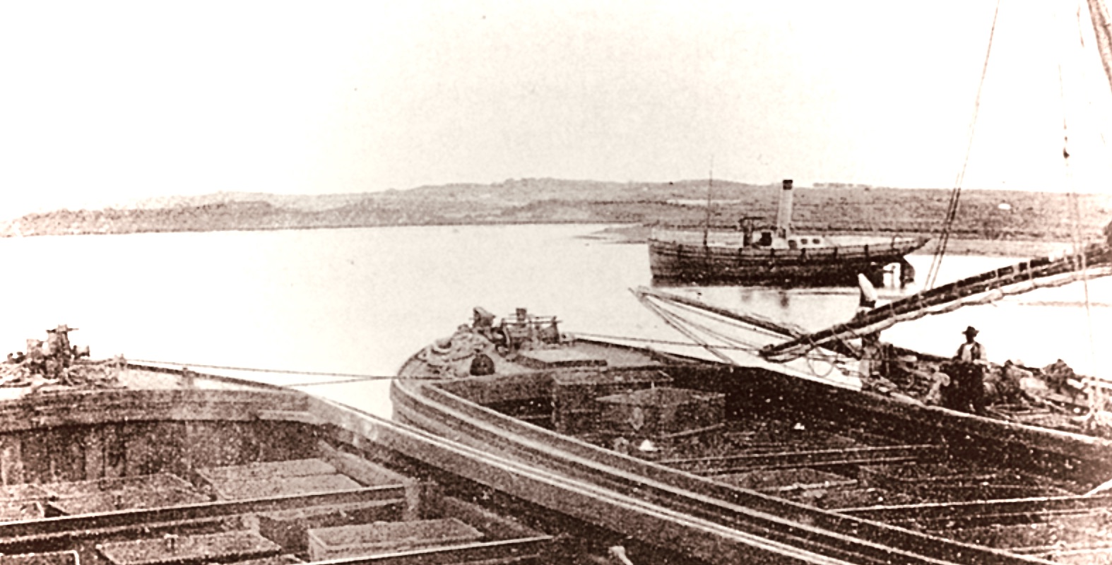 Barges at San Juan del Puerto operating under the Buitron and Huelva Railway and Mining Company